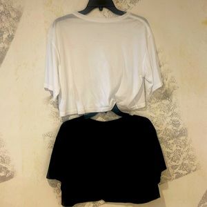 Lululemon Tops in white and black excellent condition. Sz 6-8